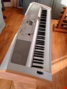 Barely used Yamaha DGX-500 88 key grand piano keyboard and stand.